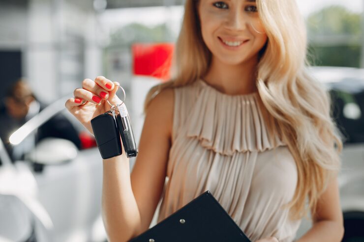 stylish-elegant-woman-car-salon_1157-24285
